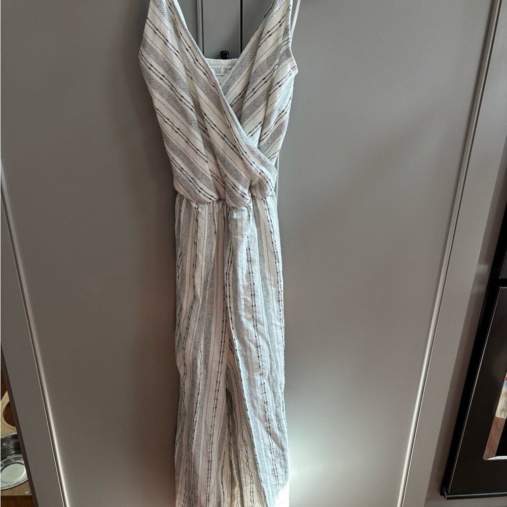 Sienna Sky Black/ White Striped jumpsuit sz small